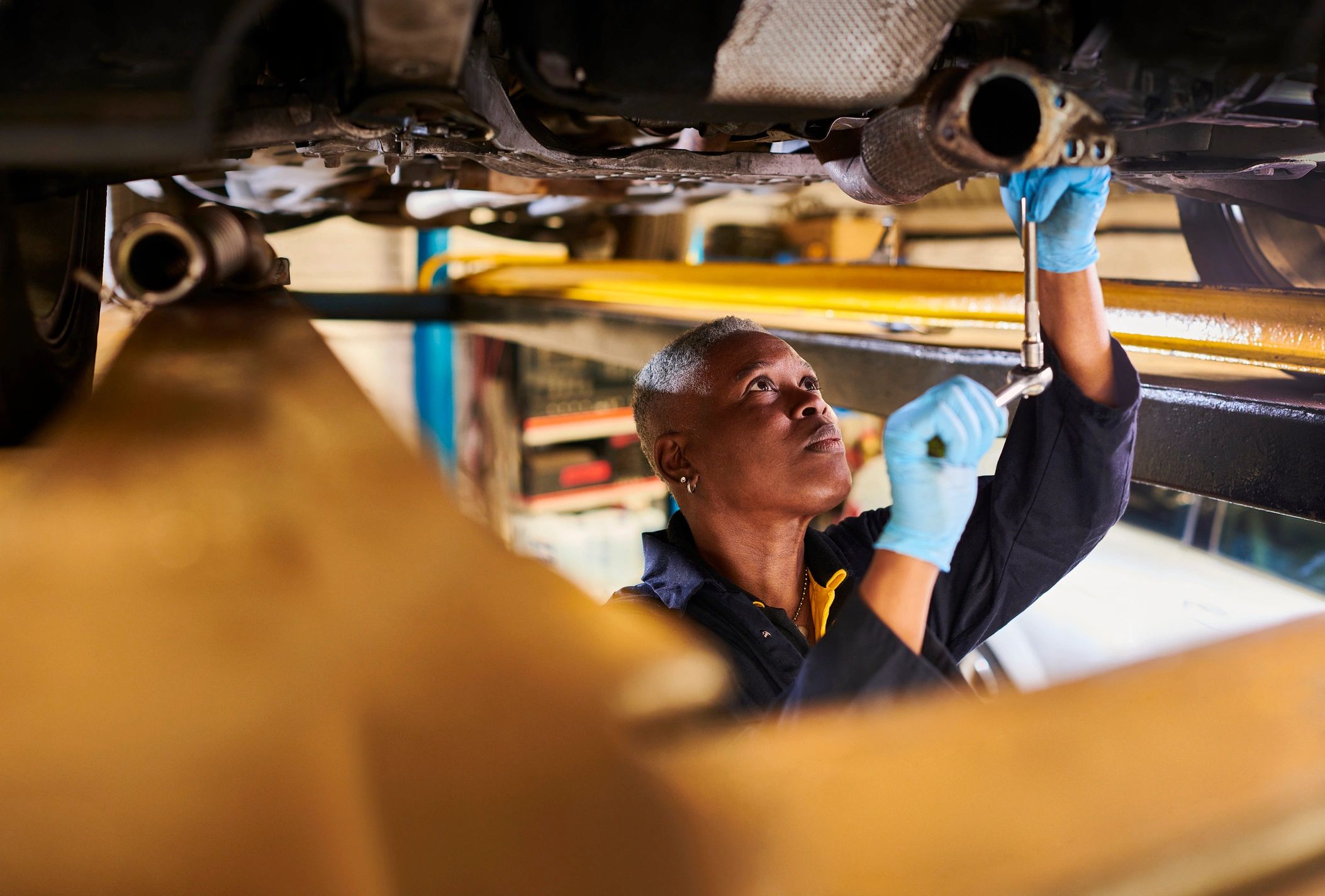 Portrait of a mechanic holding a tablet