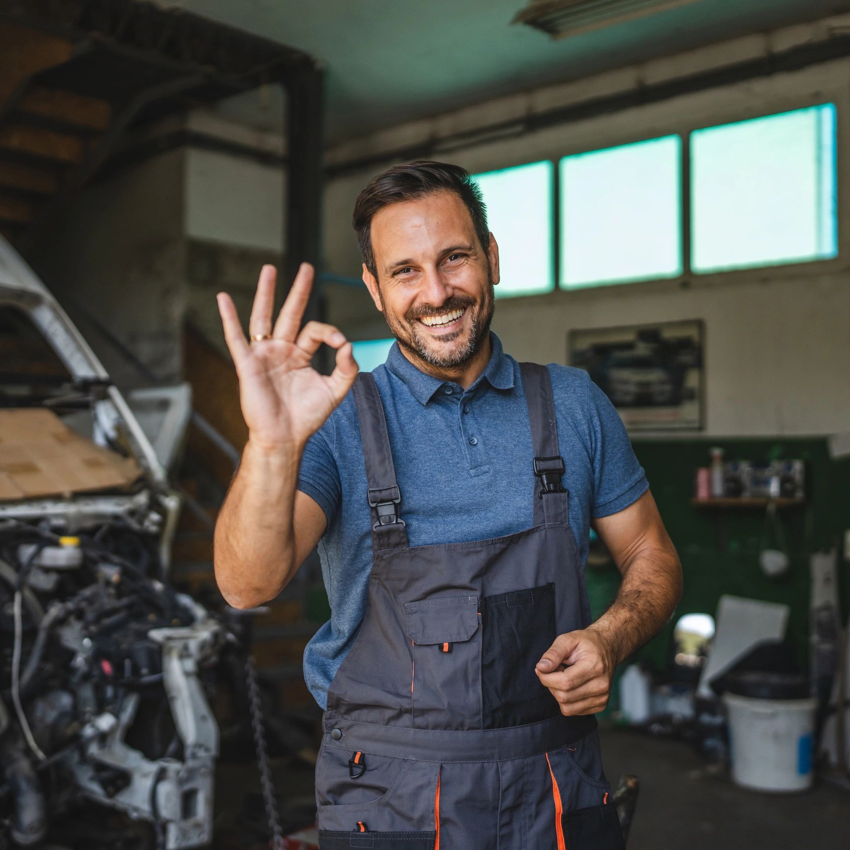 Friendly service professional in a workshop