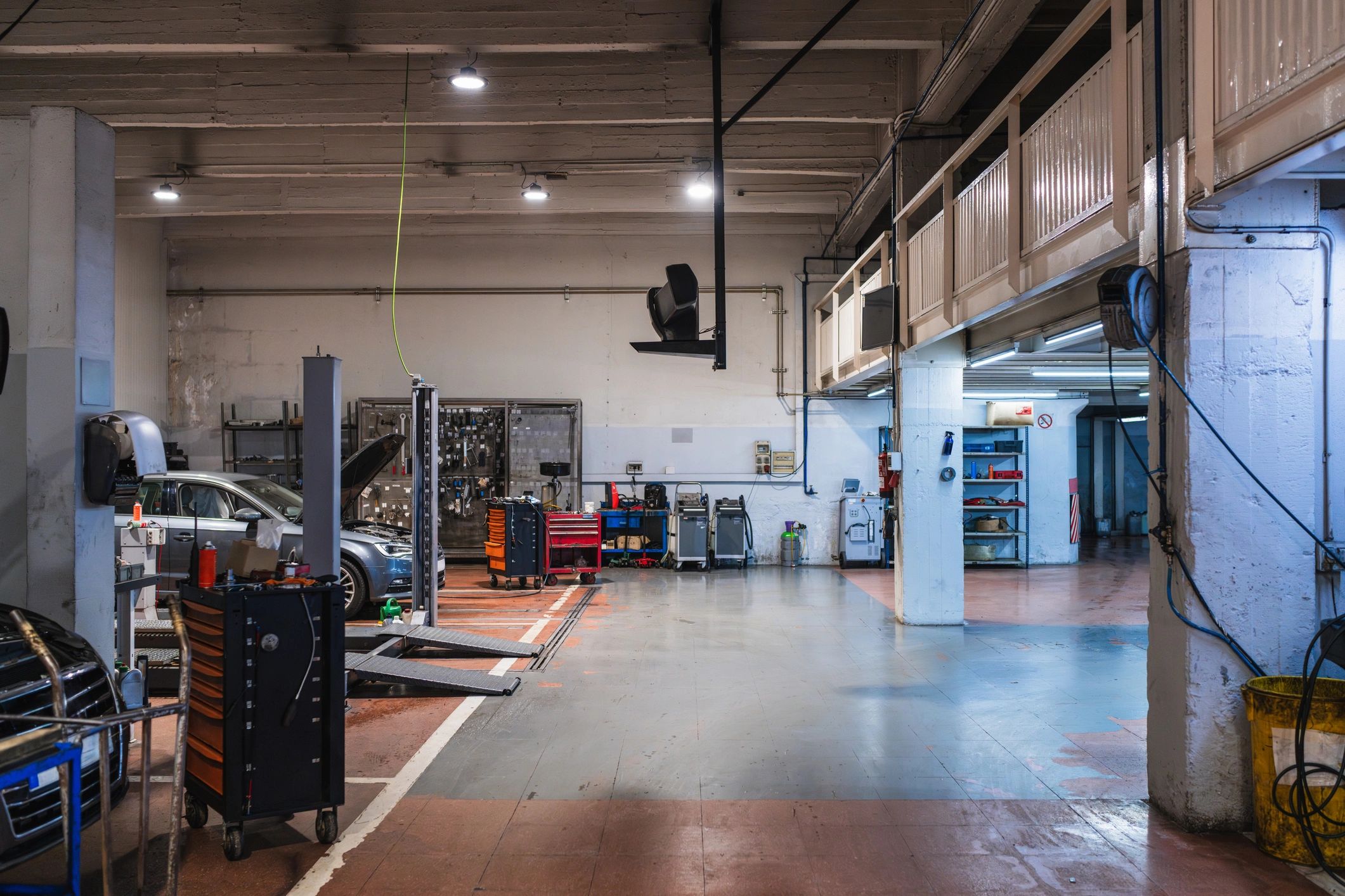 Auto repair shop service bays with vehicle lifts