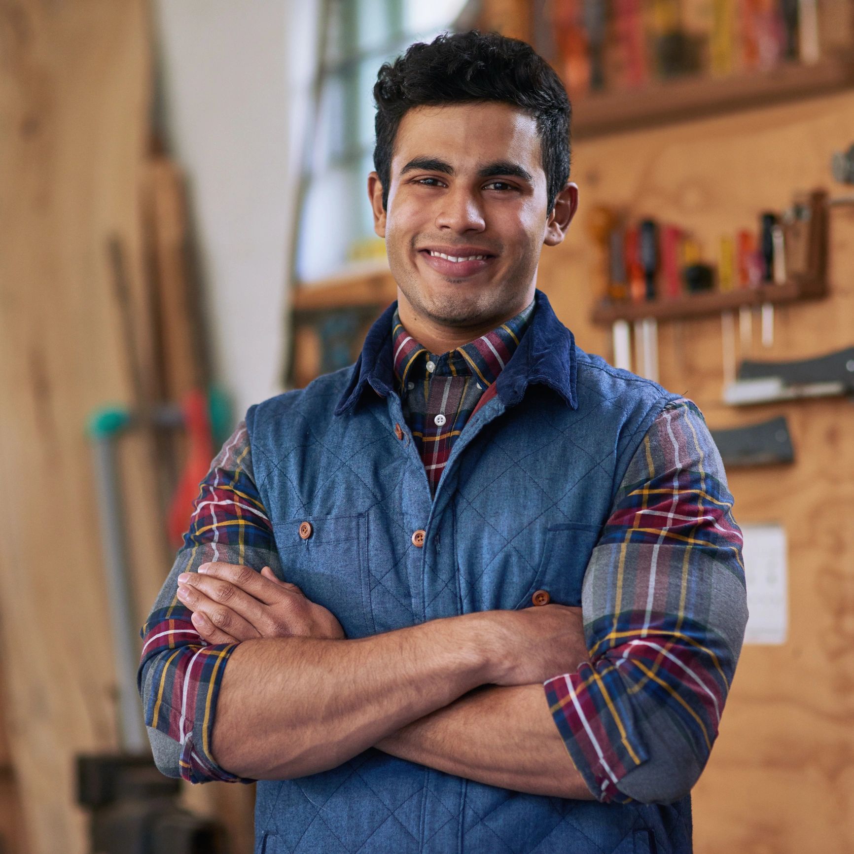 Portrait of a professional technician with arms crossed